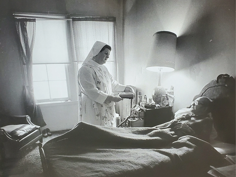 sister-alice-marie-bedside-with-client