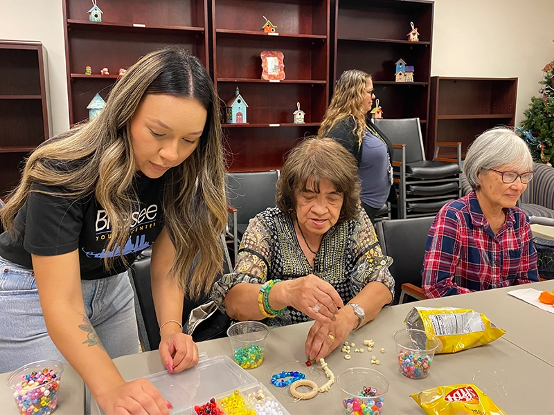 volunteer-and-seniors-doing-crafts